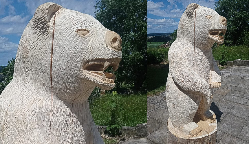 Bär aus Holz mit Kettensäge geschnitzt